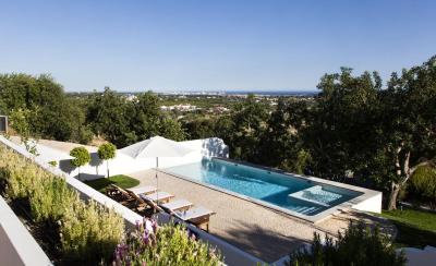 Heated private pool with sun beds